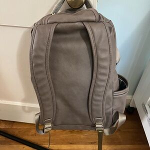 Gray Backpack with Silver Accents
